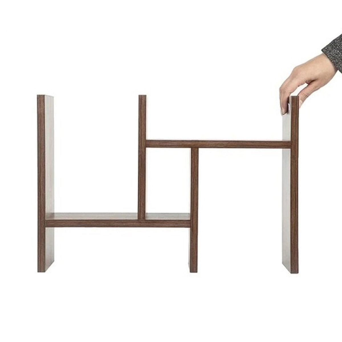 Adjustable shelf being repositioned on the wooden desk organizer