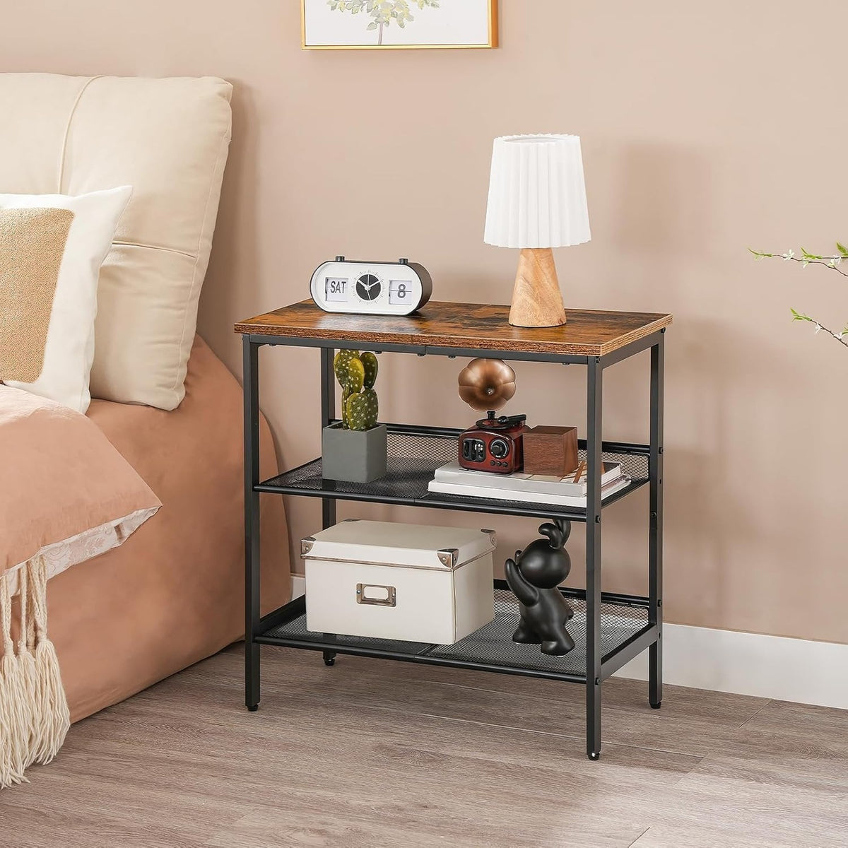 Side table styled with lamp, books and storage box