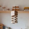 Stairs to Hanging Wooden Lamp